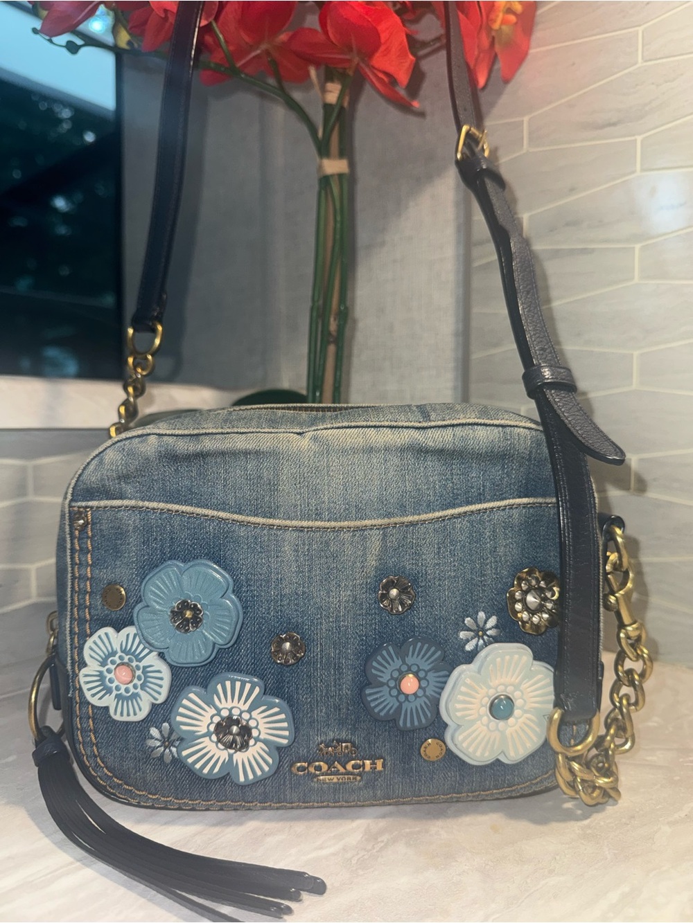 Like NEW Coach Denim Tea Rose Floral Appliquรฉ Crossbody Bag in Distressed Blue